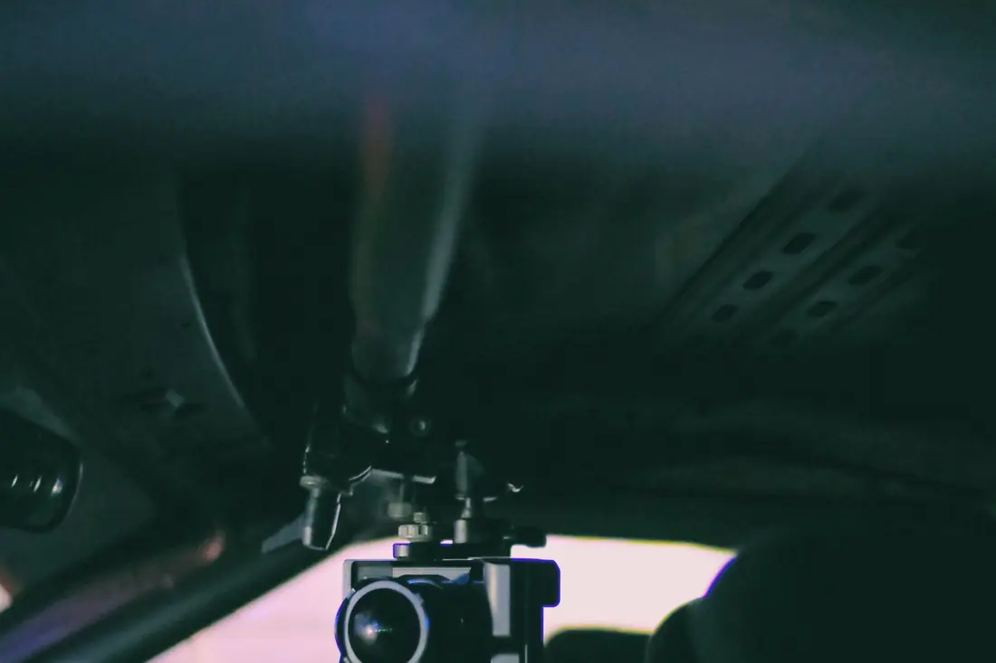 A camera mounted to film from the driver's seat