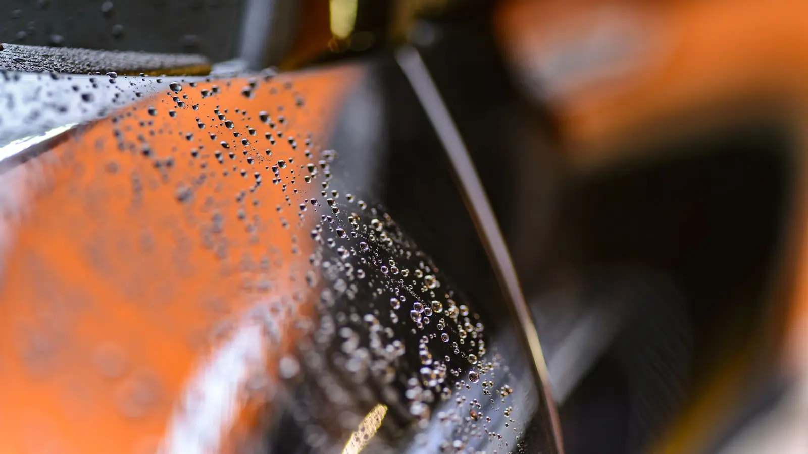 Water beading on a glossy panel