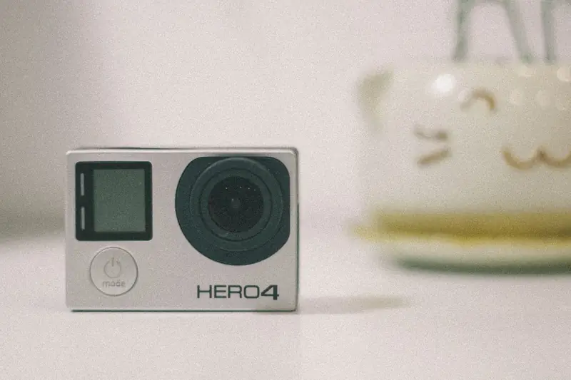 A small action camera on a desk