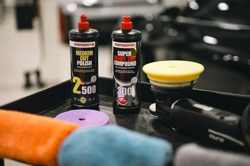 Polisher and polish bottles on a bench